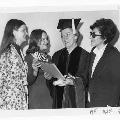 Honorary degree recipient, Honorable Martha W. Griffiths, and others (Peg Scofield, Carol Parlett, Catherine S. Murray) during academic convocation, November 2, 1975, commemorating United Nations International Women's Year.