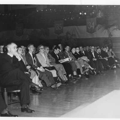 Audience listening to Labor symposium on industrial relations held October 26, 1951 in Flanigan Auditorium during centennial celebration.