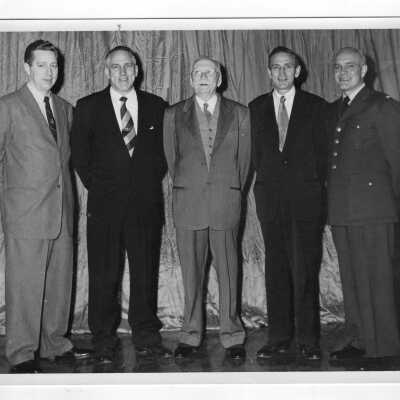 Members of the Oakes family including Joe, John (deceased 1975), Mr. Oakes, Sr., Tom, and Bill