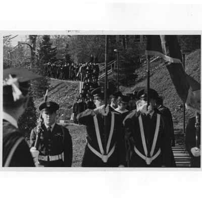 Inauguration of President Terrence Toland, S.J., November 14, 1968. View of academic procession being led by color guard of the Air Force ROTC from Drexel Library to Field House.
