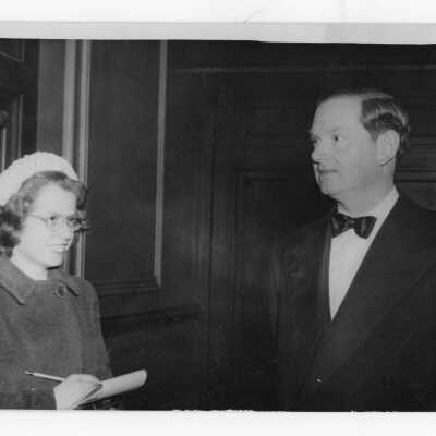 Evelyn Waugh visits campus for Lecture Forum, March 18, 1949, with Marie Cosgrove, reporter for "The Reaper", New Catholic Girls' High School.