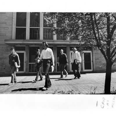 Students walking by side entrance of Villiger (later Post) Academy of Food Marketing.