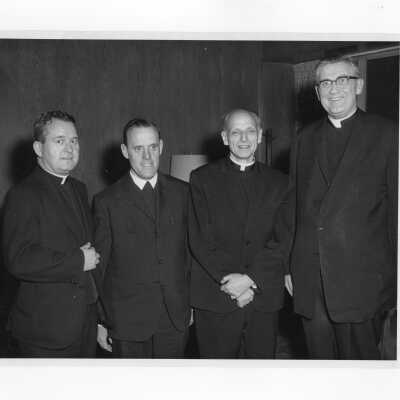 Rev. Pedro Arrupe, S.J., William F. Maloney, S.J., W. Murray Cunningham, S.J., and Francis J. Boyle, S.J., during meeting on May 6, 1966 at Loyola College, Baltimore, Maryland.
