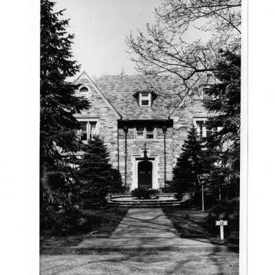 View of front walkway and entrance to Regis Hall from Lapsley Lane.