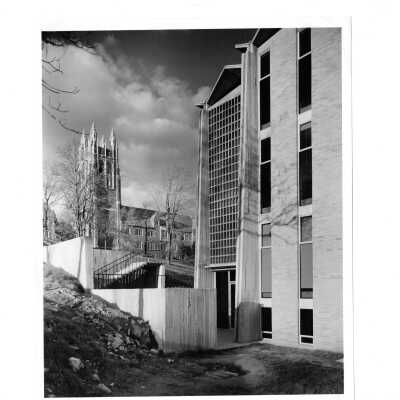 Exterior side view of Bellarmine with Barbelin Tower in background.