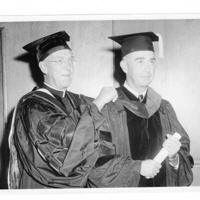 J. Joseph Bluett, S.J., with honorary degree recipient Michael Boland during October 1959 graduation/commencement.