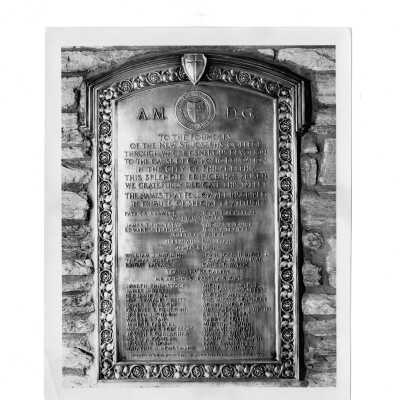 Plaque on stone wall of Barbelin building honoring donors and founders of new Saint Joseph's College.