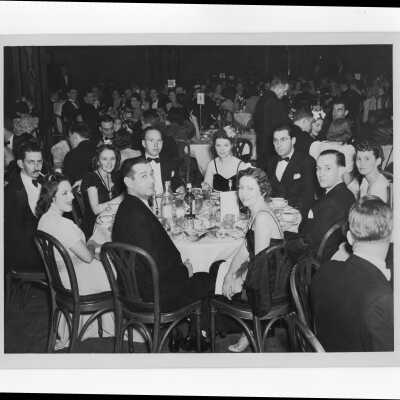Alumni association members dining at formal supper dance, c. 1939.