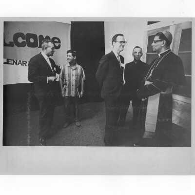 Pax Romana's 20th World Plenary Assembly meets at Saint Joseph's College, August 1968. Terrence Toland, S.J., with attendees at a welcome reception.