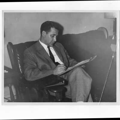 Photograph of William Ariano, president of alumni association, 1954-1955, and chairman of annual giving campaign in 1957. [ Photograph taken in January 1958.]