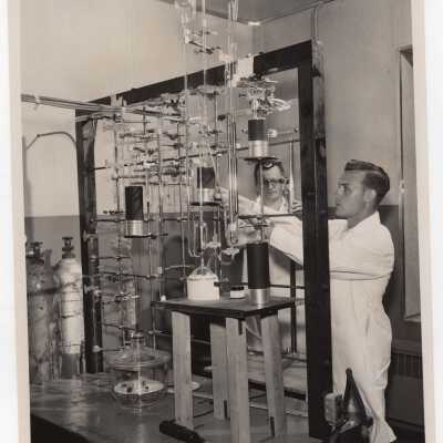 Two chemistry students conducting experiment in science labortory, July 1955.