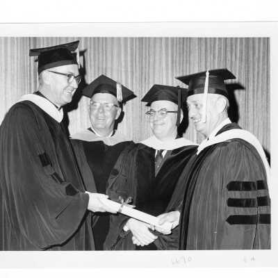 William F. Maloney, S.J., with three honorary degree recipients, W. Donald Cooke, Luther L. Terry, Michael W. McCarthy during 1966 graduation/commencement.