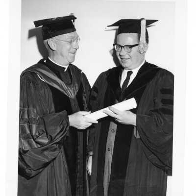 J. Joseph Bluett, S.J., with honorary degree recipient Richard J. Hughes during 1962 graduation/commencement.