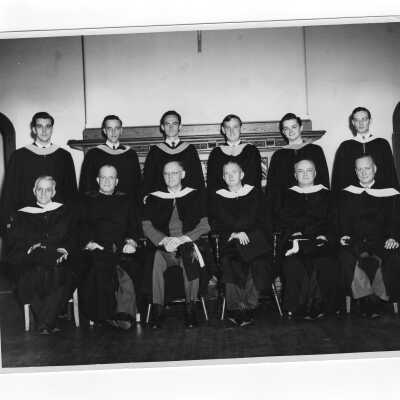 Six graduating students pictured with their fathers who were also SJC alumni at 1948 graduation/commencement. (Gruber, O'Brien, Heine, Diamond, Rosenberg, Horstmann) Two black and white prints.