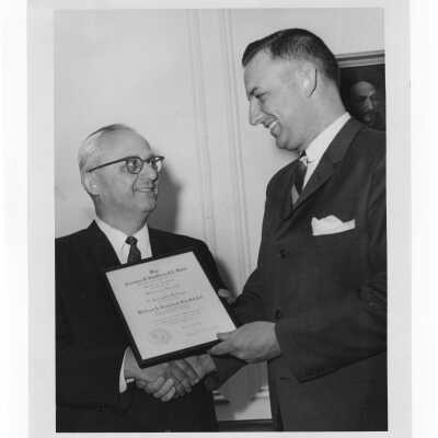 Dr. Michael Devine congratulates Shaffrey award winner, Dr. William A. Sodeman, April 29, 1962.