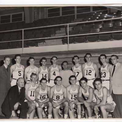 Men's Basketball Coach William Ferguson with Team and Assistant Coaches