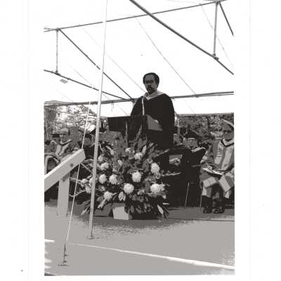 Honorary degree recipient U.S. Representative William H. Gray III addressing graduates during 1980 graduation/commencement.