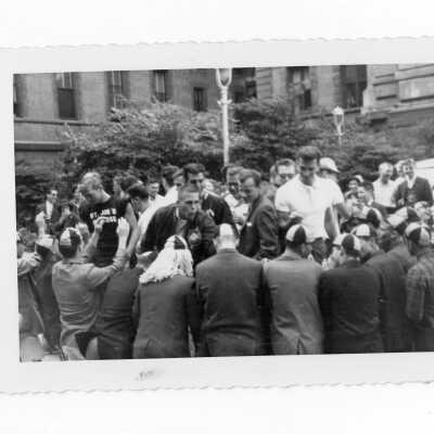 Freshman initiation activities on Juniper and Market Streets during Junior Week.