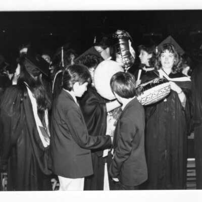 Various views of 1990 graduation/commencement in Convention Hall, Philadelphia Civic Center.