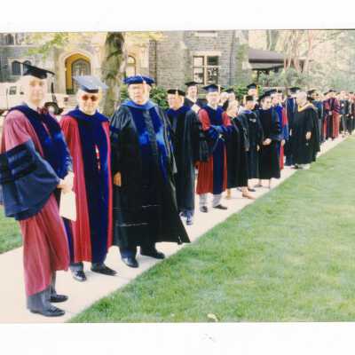 Faculty members, including F. Graham Lee, processing by Wolfington Hall during 1993 graduation/commencement ceremony for graduate students.