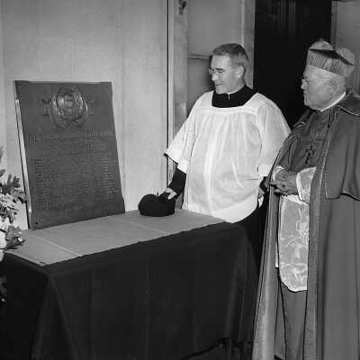 Dedication of plaque for World War II veterans in Field House (Sports Complex) with John J. Long, S.J., and Cardinal Dennis Dougherty, c. 1950.
