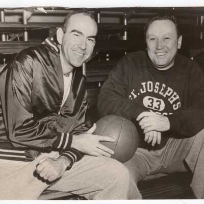 Men's Basketball Coach Jack Ramsay, with assistant.