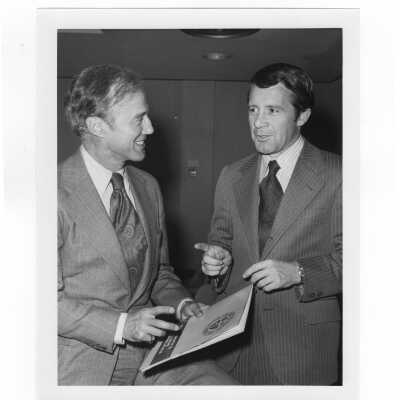 Norman Denny and John Bunting discussing agenda during Conference on Corporate Social Responsibility, March 6, 1974.
