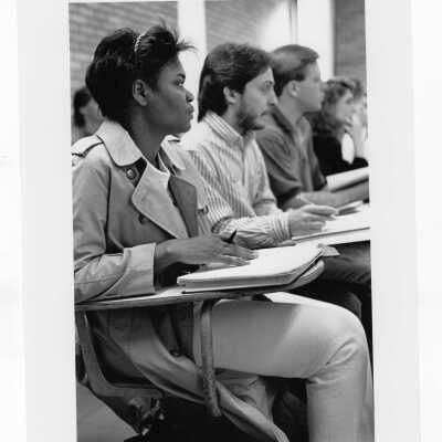 Students listening to lecture and taking notes.