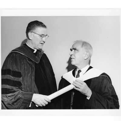 William F. Maloney, S.J. with honorary degree recipient, James Creese during October 1962 graduation/commencement.