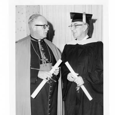 Honorary degree recipienct, Bishop George Guilfoyle and Alfred H. Weber during September 1968 graduation/commencement.
