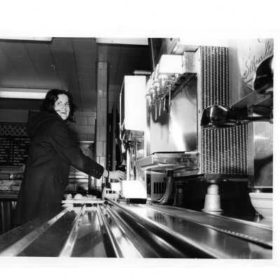 Female student getting meal in Campion cafeteria.