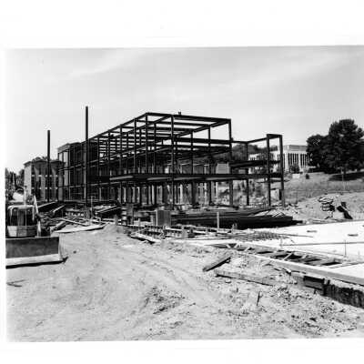 Early construction of Villiger (later Post) Academyof Food Marketing with Bellarmine in background.