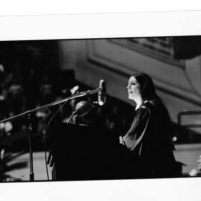 Woman graduate addressing audience during 1971 graduation/commencement.