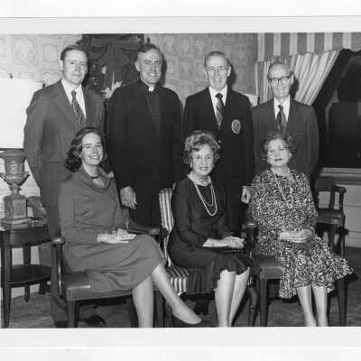 Donald I. MacLean, S.J., with members of Trainer family (Regina Trainer, Anne Trainer, Peg Trainer, William Trainer, Raymond Trainer, Clem Trainer)