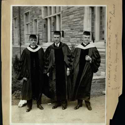 View of audience, graduating students, and speaker during 1928 commencement/graduation held in Barbelin quadrangle.