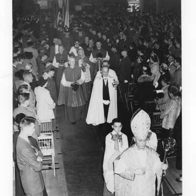 Recessional from pontifical mass for centennial celebration held in Field House, with Bishop Hugh Lamb, Amleto Giovanni Cicognani, and mr. Doyle (?)