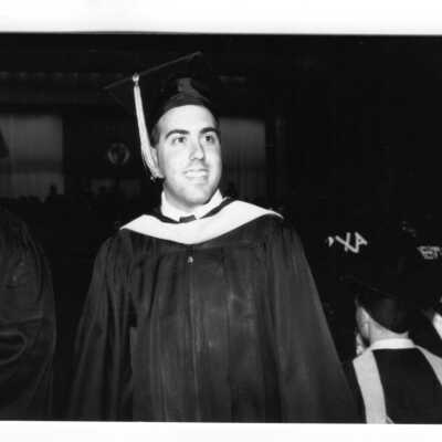 Views of small groups of graduates during 1990 graduation/commencement.