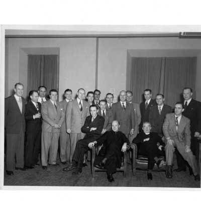 Alumni reunion of class of 1936, held c. 1948. Includes Joseph S. Hogan, S.J.