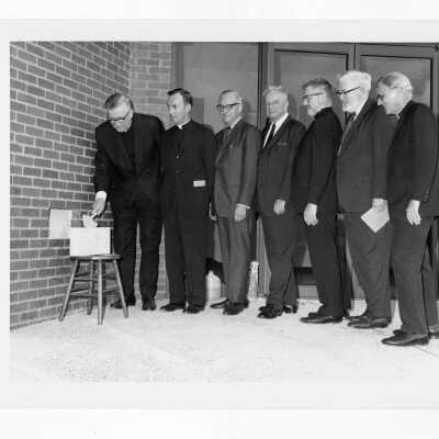 Laying of cornerstone of science center with William F. Maloney, S.J., Terrence Toland, S.J., Dr. James E. Dougherty, and others.