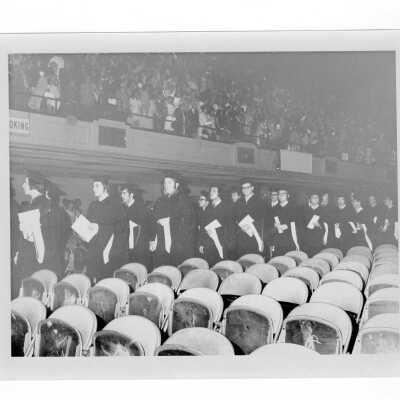 Graduates processing in Philadelphia Civic Center Convention Hall during 1971 graduation/commencement.
