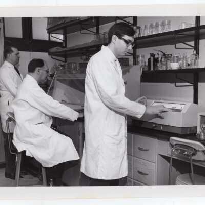 Biology professor, Louis Marks and colleagues using new equipment in science laboratory, March 1968.