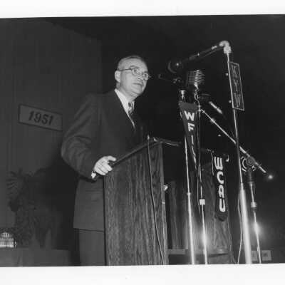 James V. Hayes, speaking at labor symposium on industrial relations held October 26, 1951 in Flanigan Auditorium during centennial celebration.