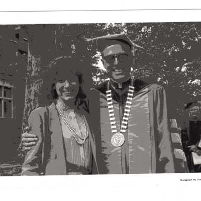 Donald I. MacLean, S.J., with Mary Louise Finlayson duirng 1980 graduation/commencement.