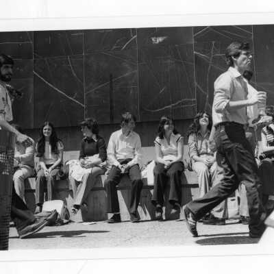 Students sitting and talking outside Campion.