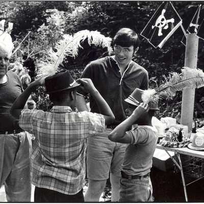 Students from "The House" or SJC Commune at 17th and Girard Streets, Philadelphia, with neighborhood children at street fair.