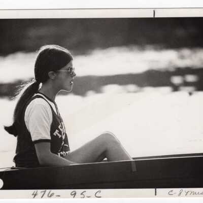 Women's crew/rowing team member practicing.