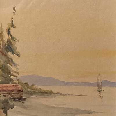 Coastal View: Boathouse and Sailboat