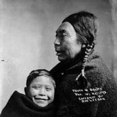 Kwakiutl woman, Ne-kow-se-sla, and grandson, 190?. Inscription: Youth & Beauty Van. Is: Natives [Quatsino Sound, B.C.] Copyright by Ben William Leeson [1866-1948]: From Vancouver Public Library (Acc. No. 71760)