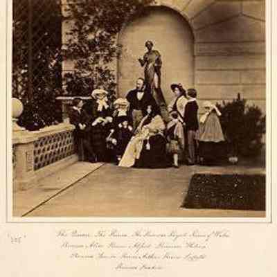 The Royal Family on the terrace at Osborne [House, Isle of Wight, U.K.], 26 May 1857.: Albumen print by Caldesi & Montecchi. Royal Collection Trust, U.K. 
From left to right (Queen Victoria and Prince Albert with their nine children): Prince Alfred, Princess Alice, Princess Helena, Prince Leopold, Prince Albert, the Queen holding Princess Beatrice, Prince Arthur, Princess Royal, Prince of Wales and Princess Louise.