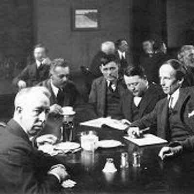 Six of the Group of Seven (Canadian landscape painters), 1920 . Photograph by Arthur Goss (1881-1940). Six of the Group of Seven, plus their friend Barker Fairley, in 1920. From left to right: Frederick Varley, A. Y. Jackson, Lawren Harris, Barker Fairley, Frank Johnston, Arthur Lismer, and J. E. H. MacDonald. The photo was taken at The Arts and Letters Club of Toronto.: From City of Toronto Archives